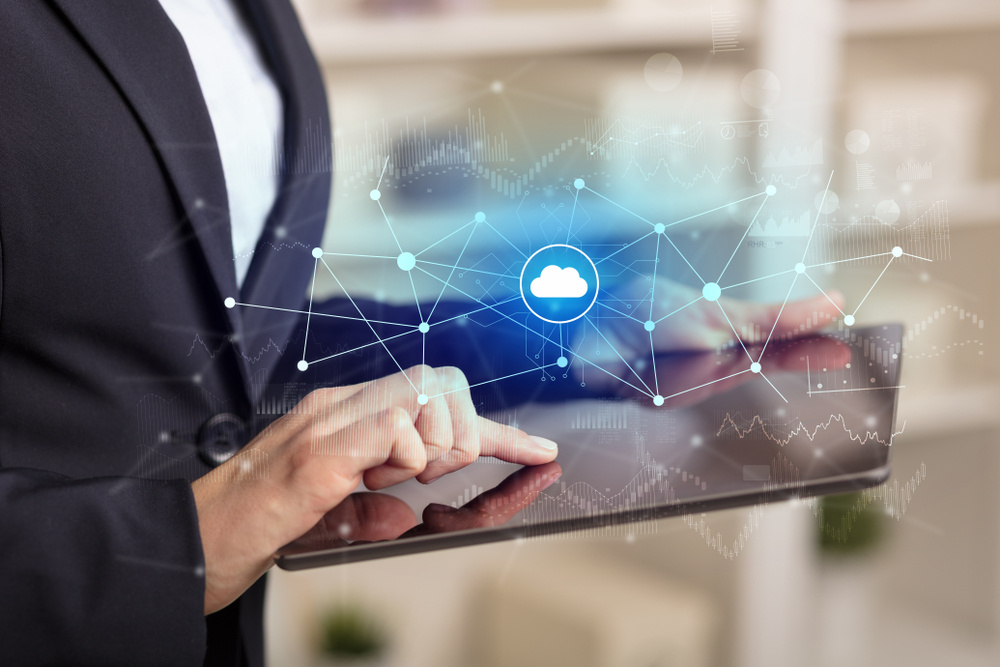 Business woman using tablet with financial, cloud connectivity concept Business woman using tablet with financial, cloud connectivity concept